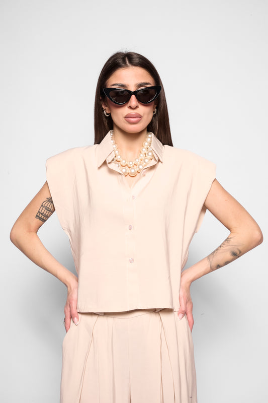 Top ampio con spalline