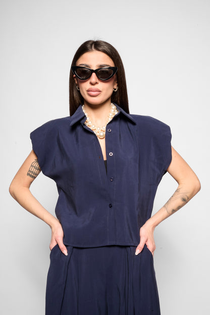 Top ampio con spalline