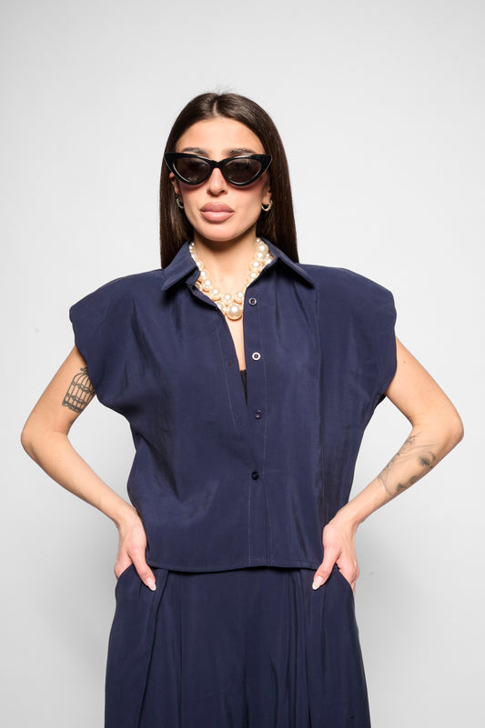 Top ampio con spalline
