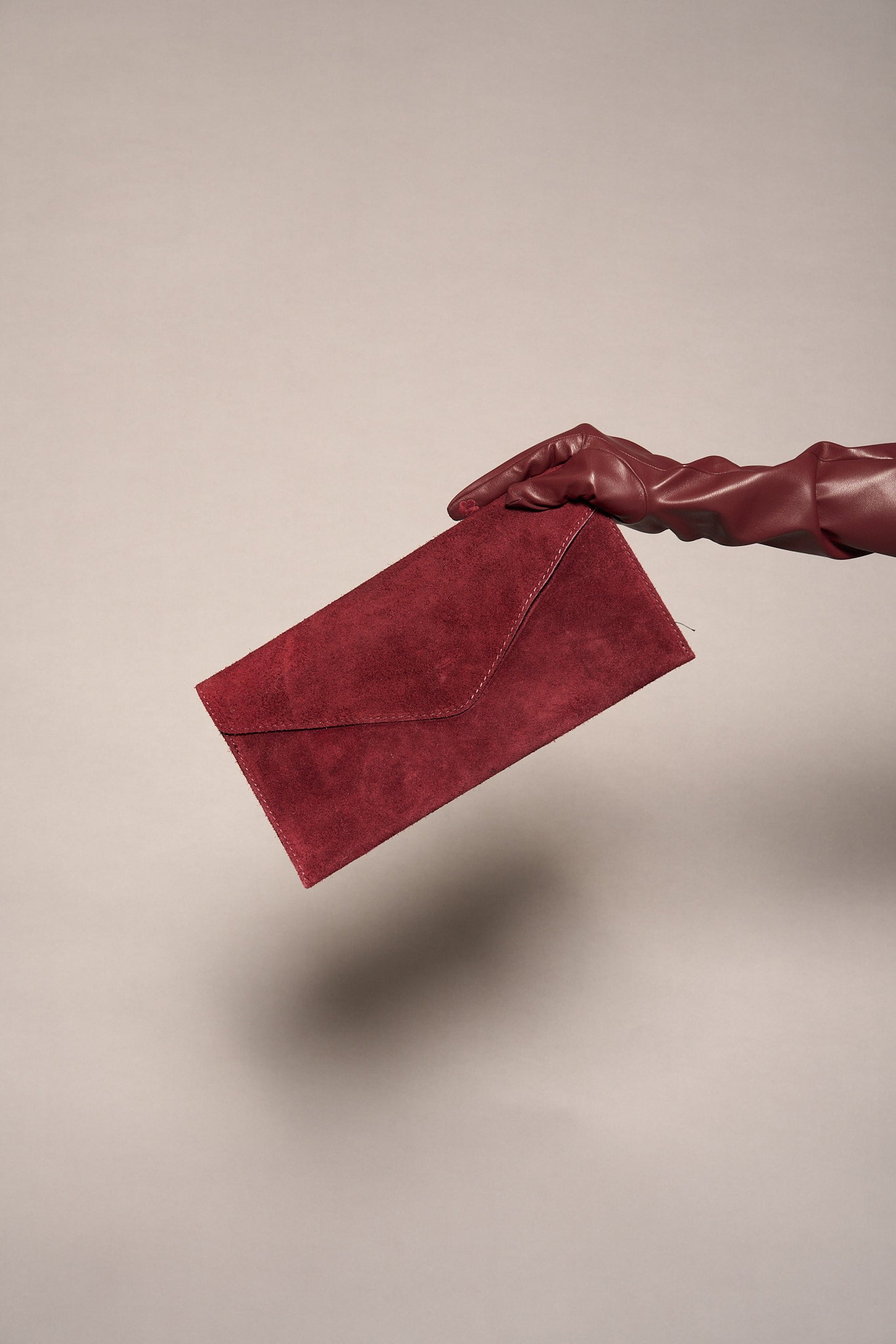 Pochette suede bordeaux