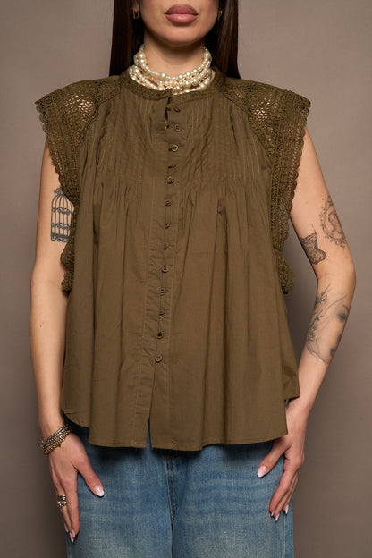 Top verde ricami